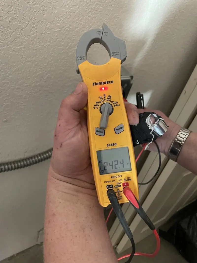 Voltage testing with clamp meter during Electrical Installation Services in Zephyrhills South